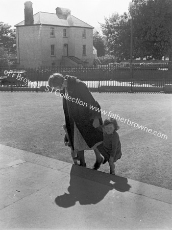 MOTHER AND CHILDREN OUTSIDE CATHEDRAL